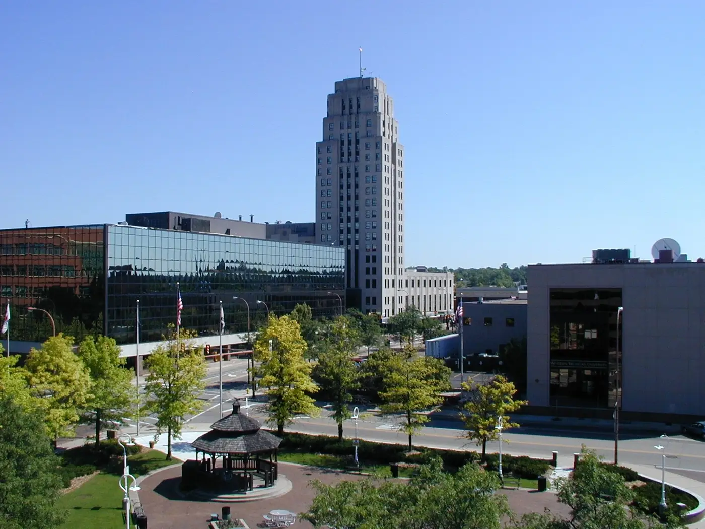Downtown Battle Creek skyline with a tall tower and a park gazebo